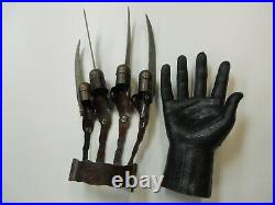 A Nightmare on Elm Street Freddy Krueger metal glove prop replica by NECA